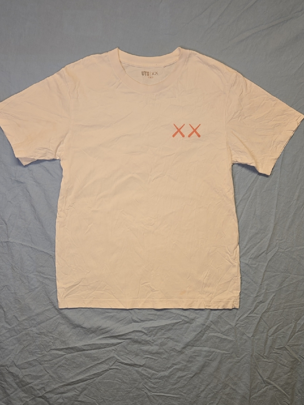 Uniqlo Kaws 2023 White Short Sleeve Crewneck T Shirt with Pink Graphic